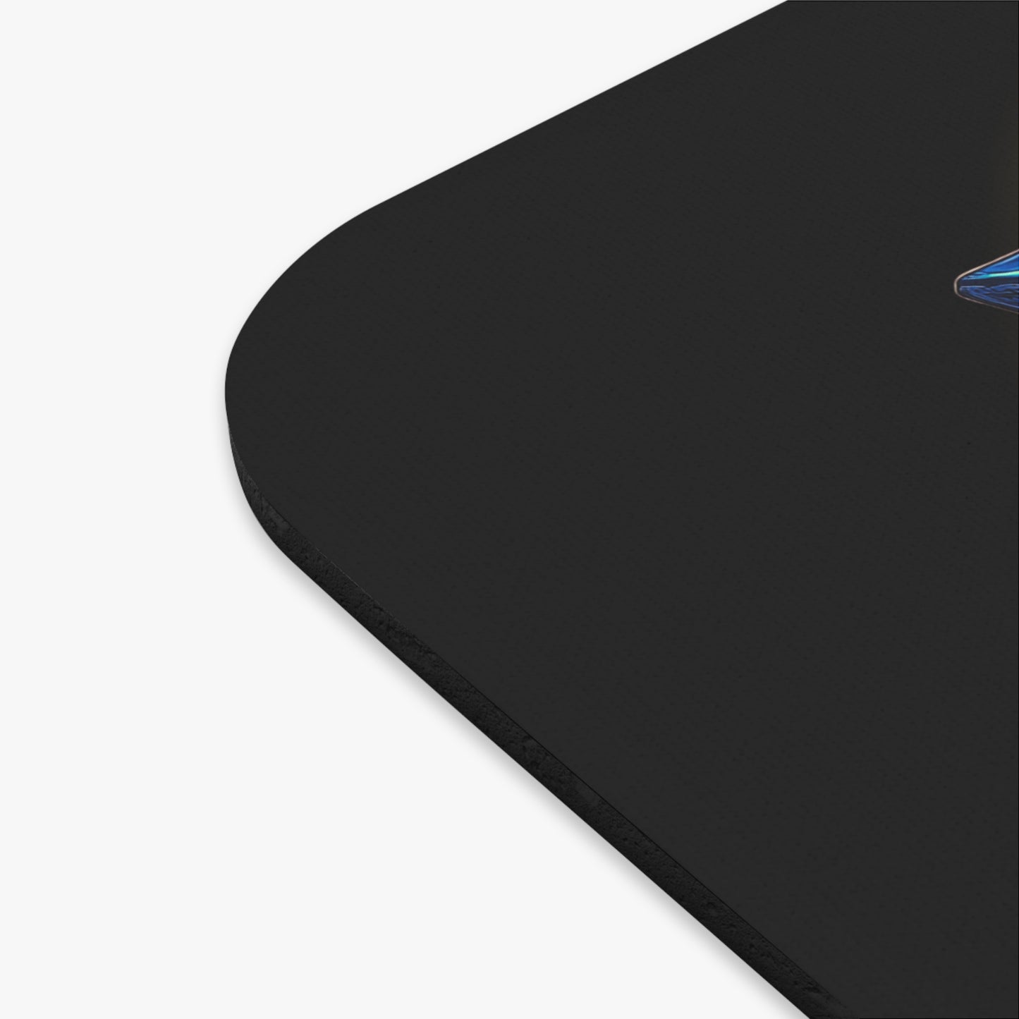 Close-up of black birth month mouse pad corner with smooth rounded edges