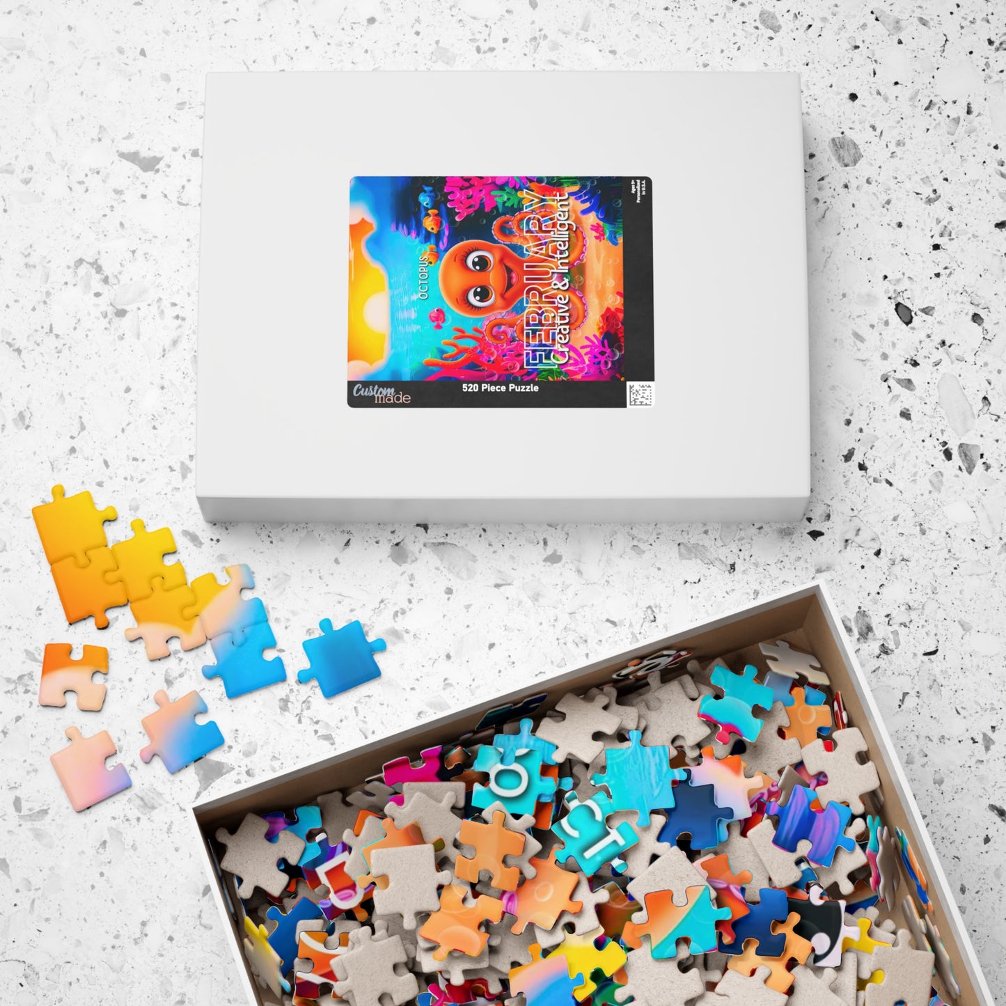 Kids birth month puzzle featuring colorful underwater February design with 520 pieces in white box
