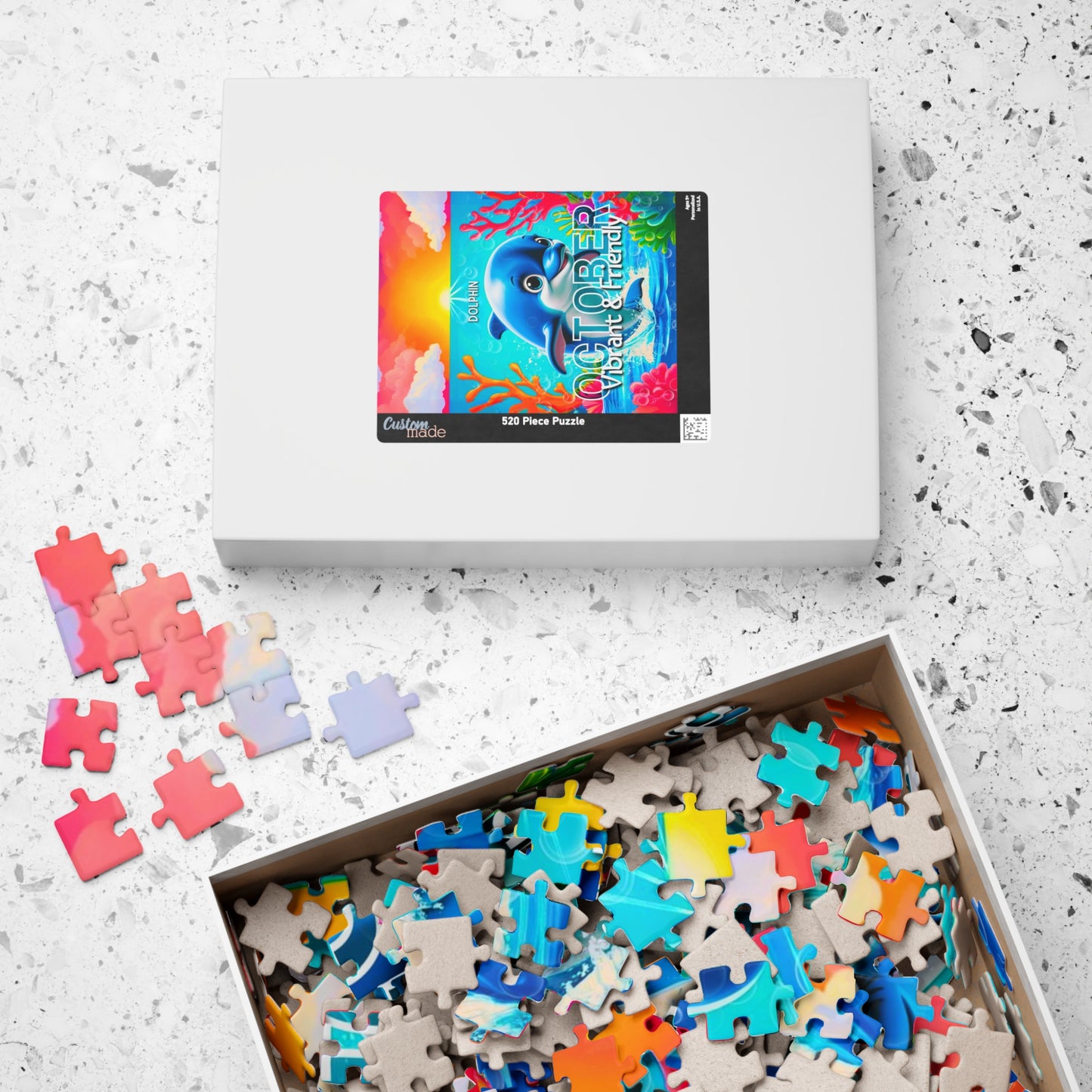 Kids birth month puzzle with colorful dolphin image and loose puzzle pieces