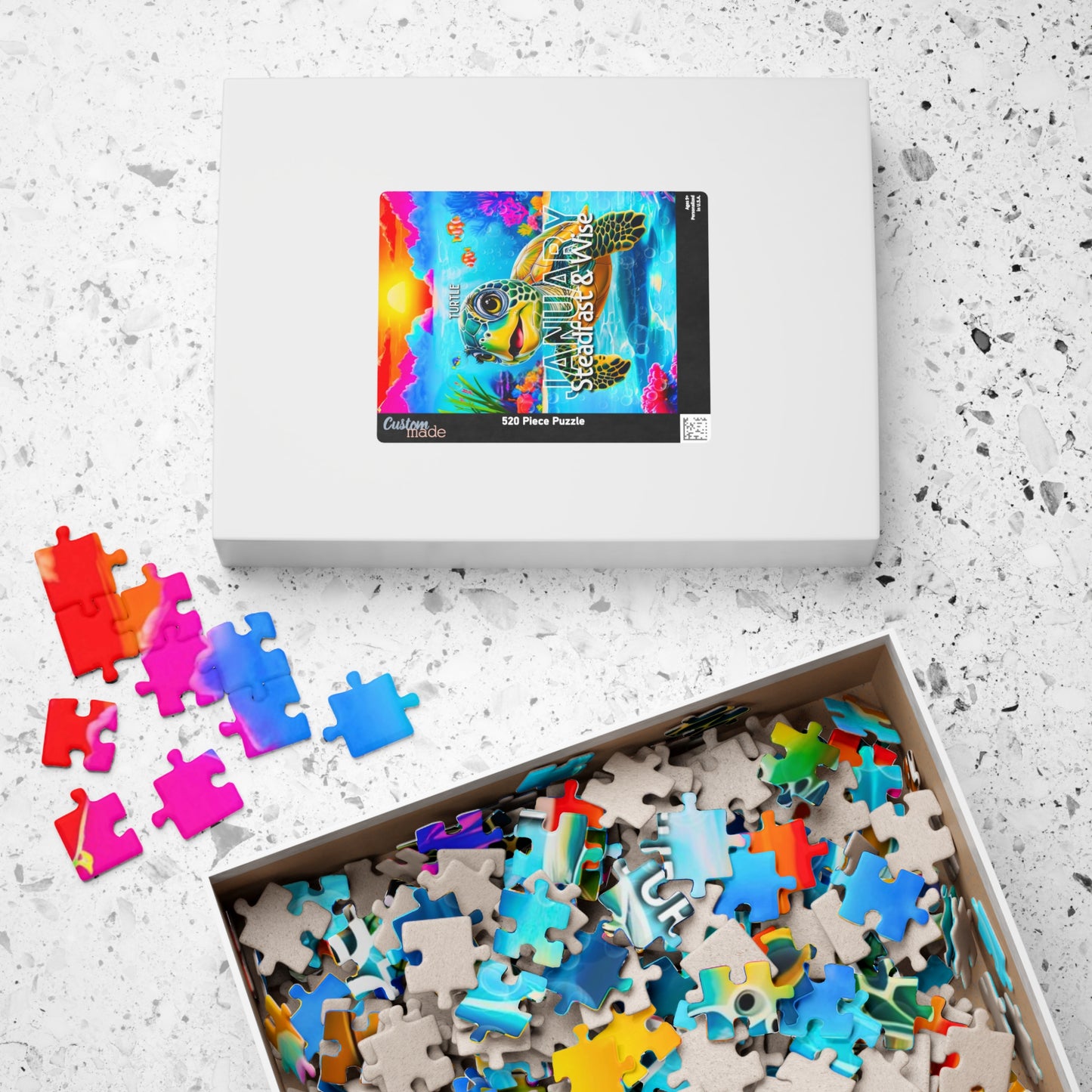 Kids birth month puzzle with colorful turtle design and scattered puzzle pieces in box