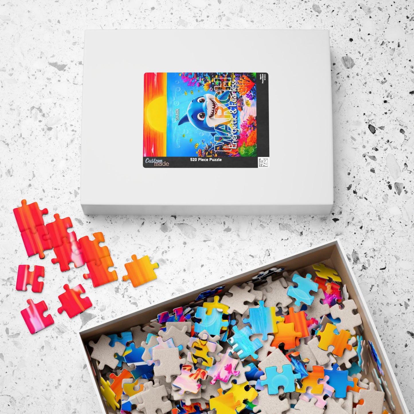 Kids birth month puzzle with colorful ocean-themed pieces and shark image on box