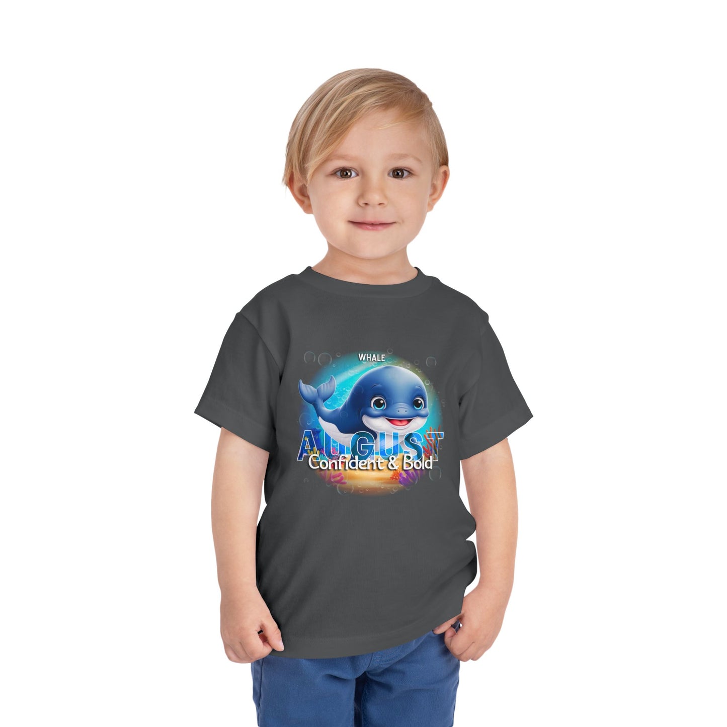 Toddler wearing kids birth month tshirt with August whale design and confident bold text
