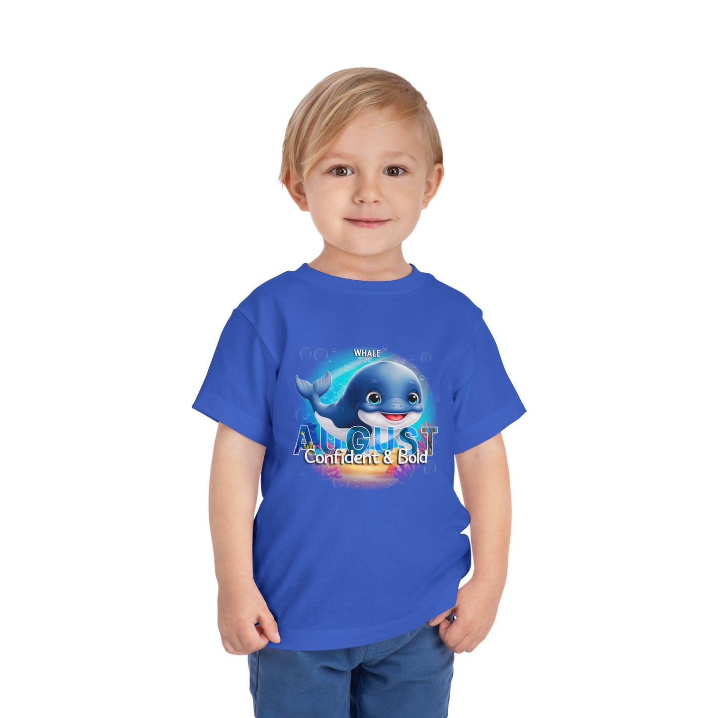 Toddler wearing a blue kids birth month tshirt with a whale graphic and August text
