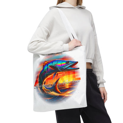 White birth month beach tote with colorful barracuda fish design and lettering carried by person