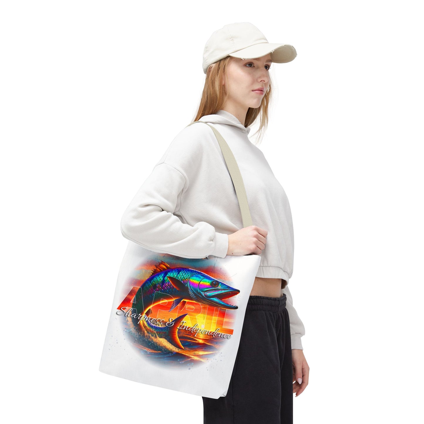 Birth month beach tote featuring colorful fish design carried by woman in casual outfit