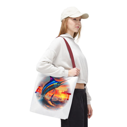 Woman carrying birth month beach tote with August design and marlin fish artwork