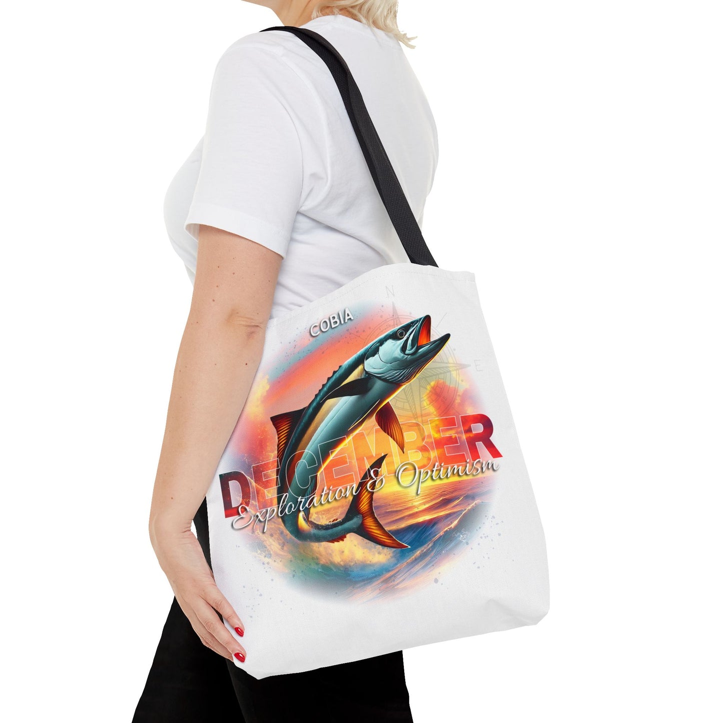 Birth month beach tote with December design featuring a fish and colorful sunset artwork