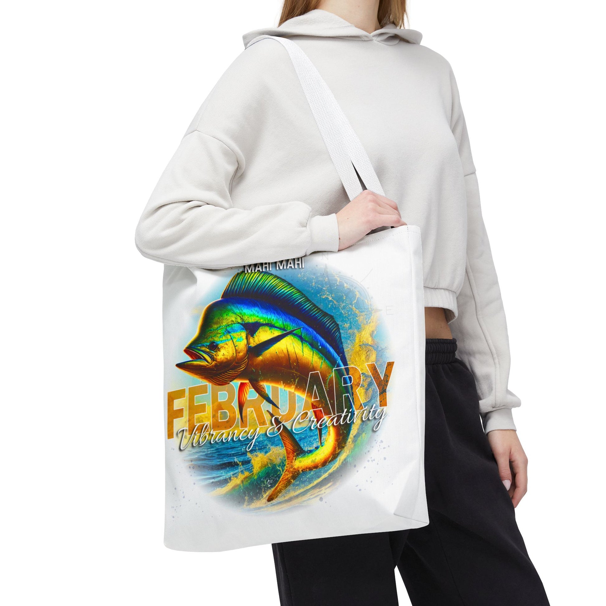 Birth month beach tote with vibrant February fish design carried by person