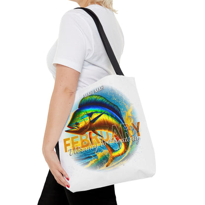 Birth month beach tote with colorful February Mahi Mahi fish design worn on shoulder