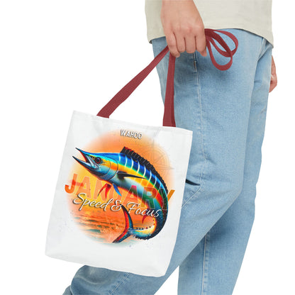 Birth month beach tote with colorful marlin fish design and red handles held by person