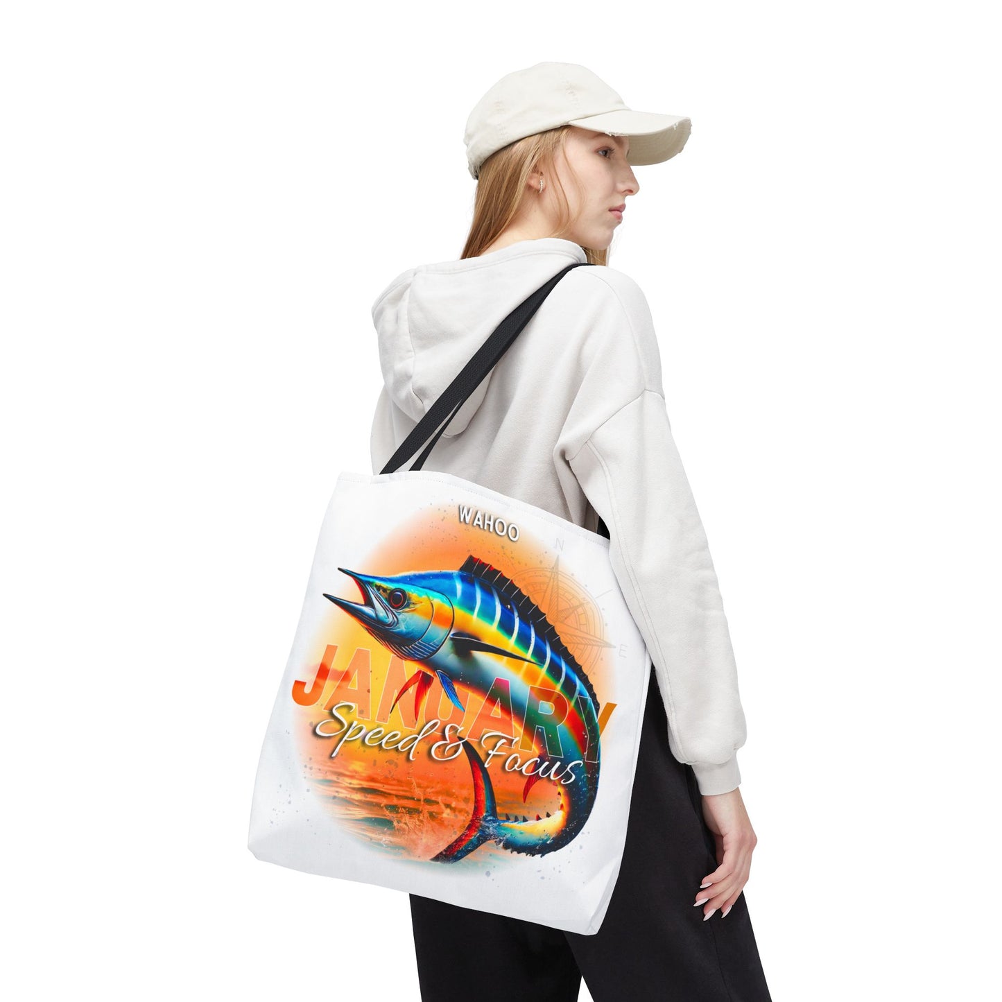 Birth month beach tote with colorful fish design carried by woman in casual outfit