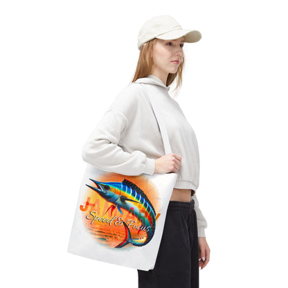 Birth month beach tote with colorful marlin fish design carried by woman in casual outfit