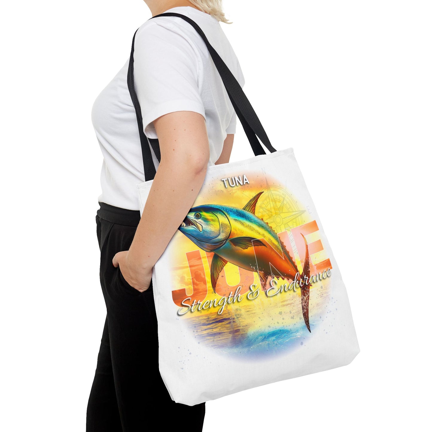 Birth month beach tote with colorful tuna fish design and Joyce name held by woman wearing white shirt
