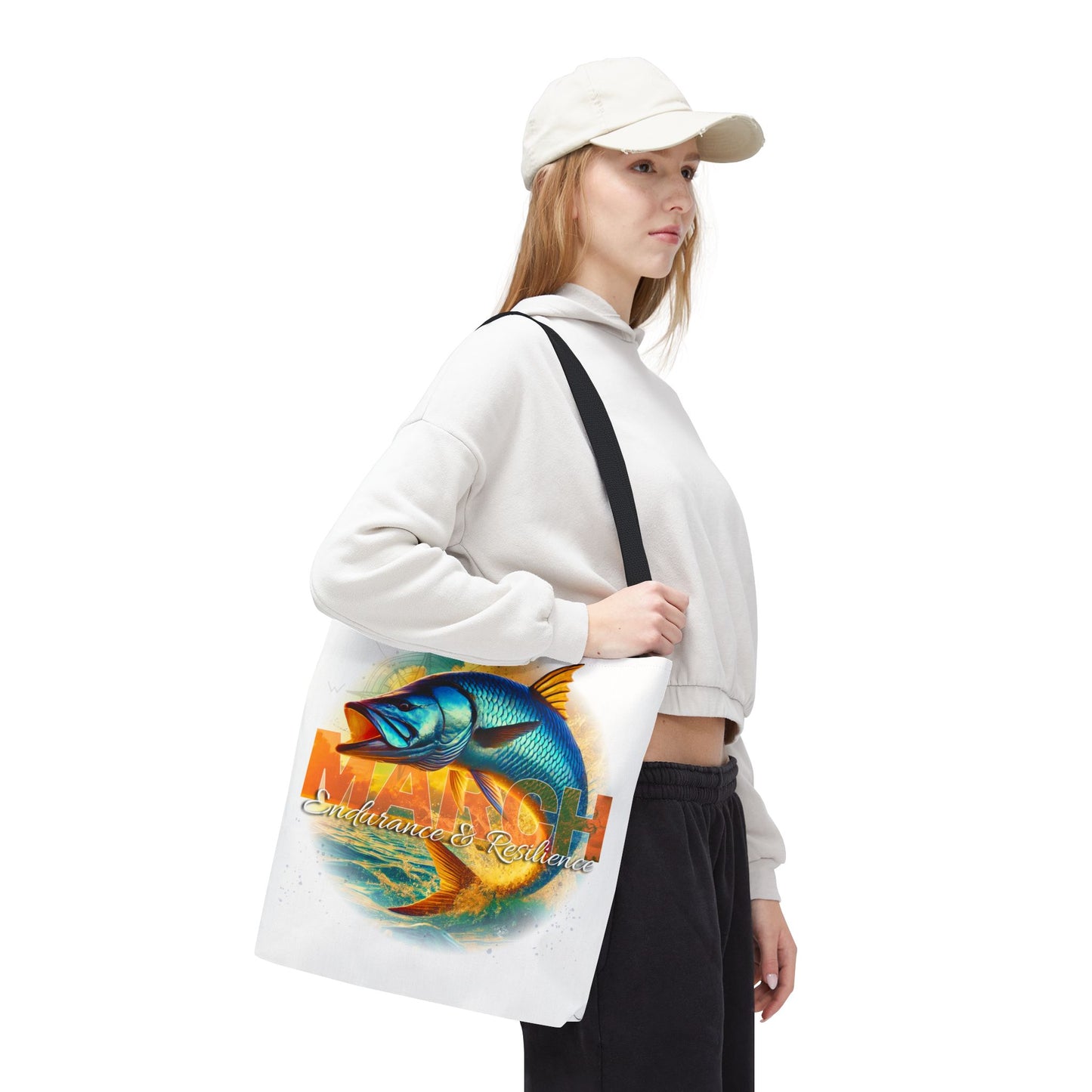 Birth month beach tote featuring colorful March fish design carried by woman in casual outfit