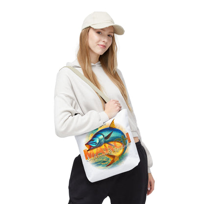 Birth month beach tote with colorful fish design carried by woman in casual outfit