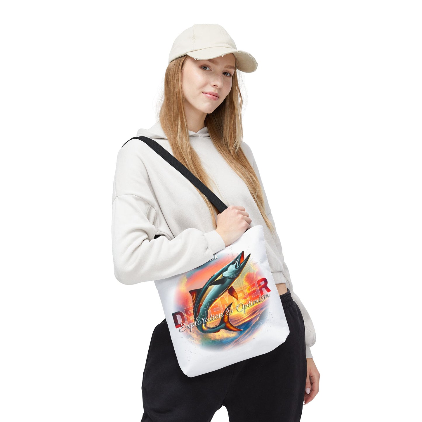 Woman wearing casual outfit carrying birth month beach tote with colorful fish design