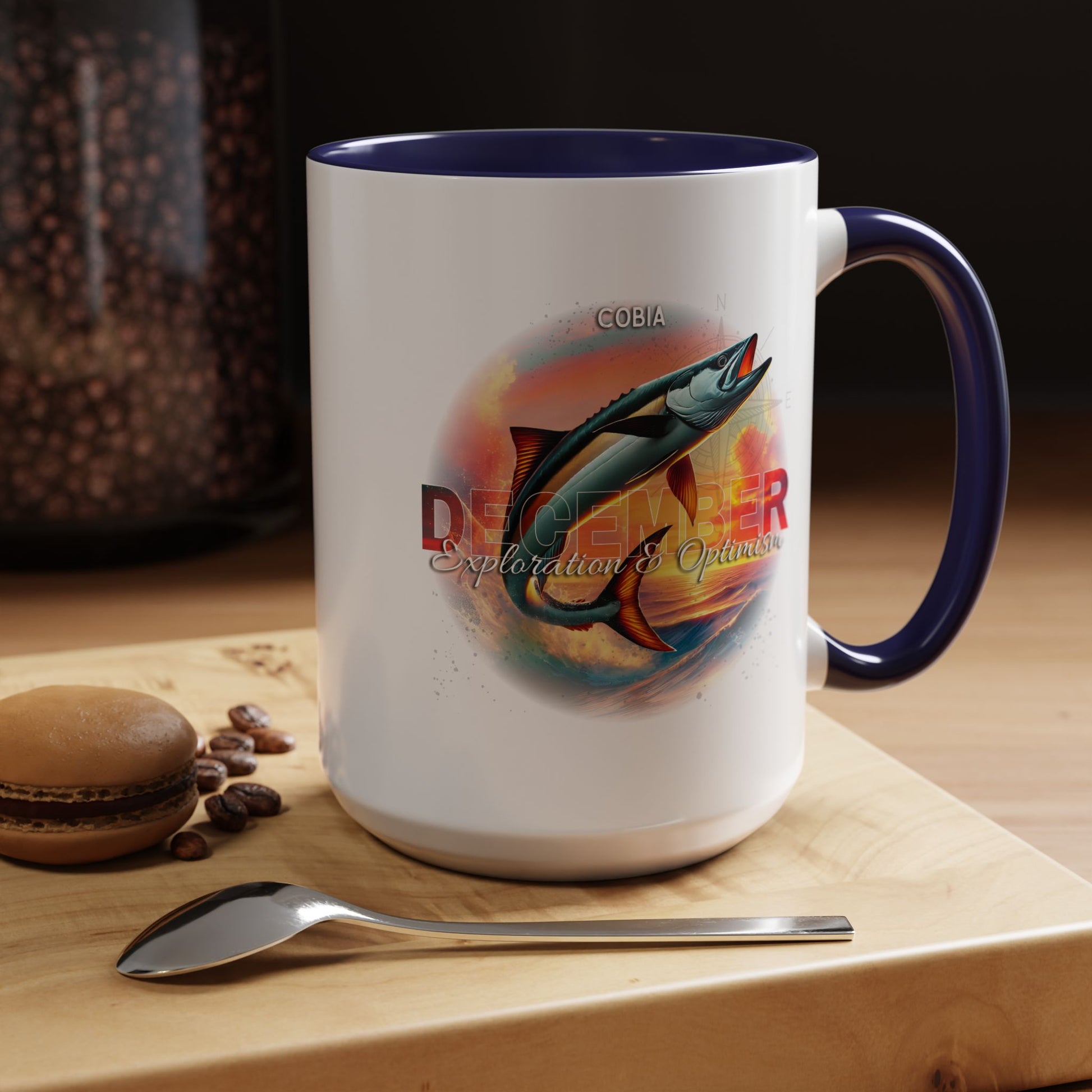 December birth month coffee mug featuring a colorful fish design with navy handle and rim