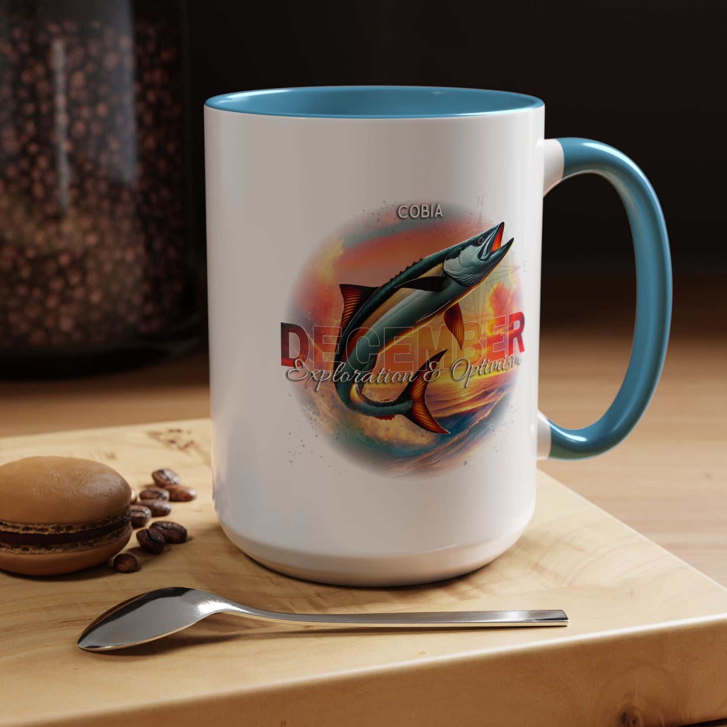 December birth month coffee mug with colorful fish design and blue handle 