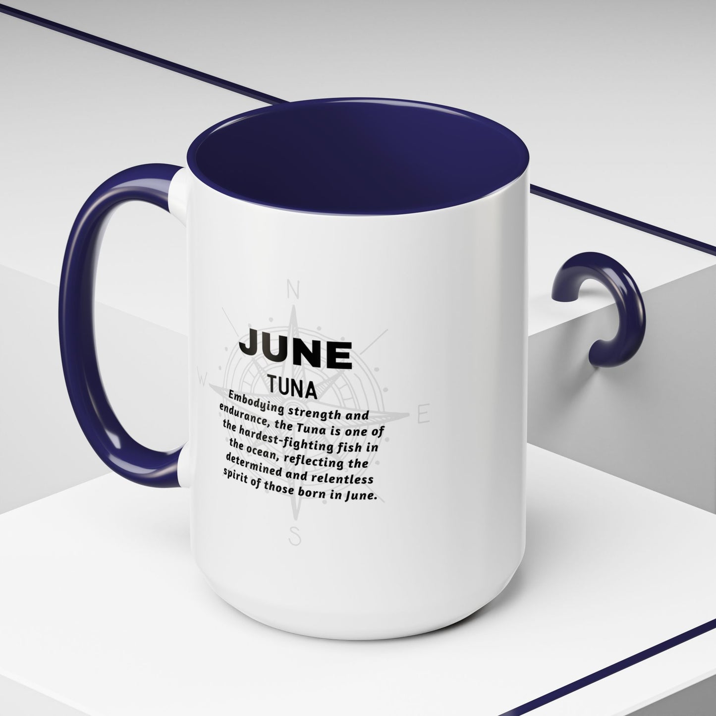 June birth month coffee mug with tuna design and navy blue handle and interior