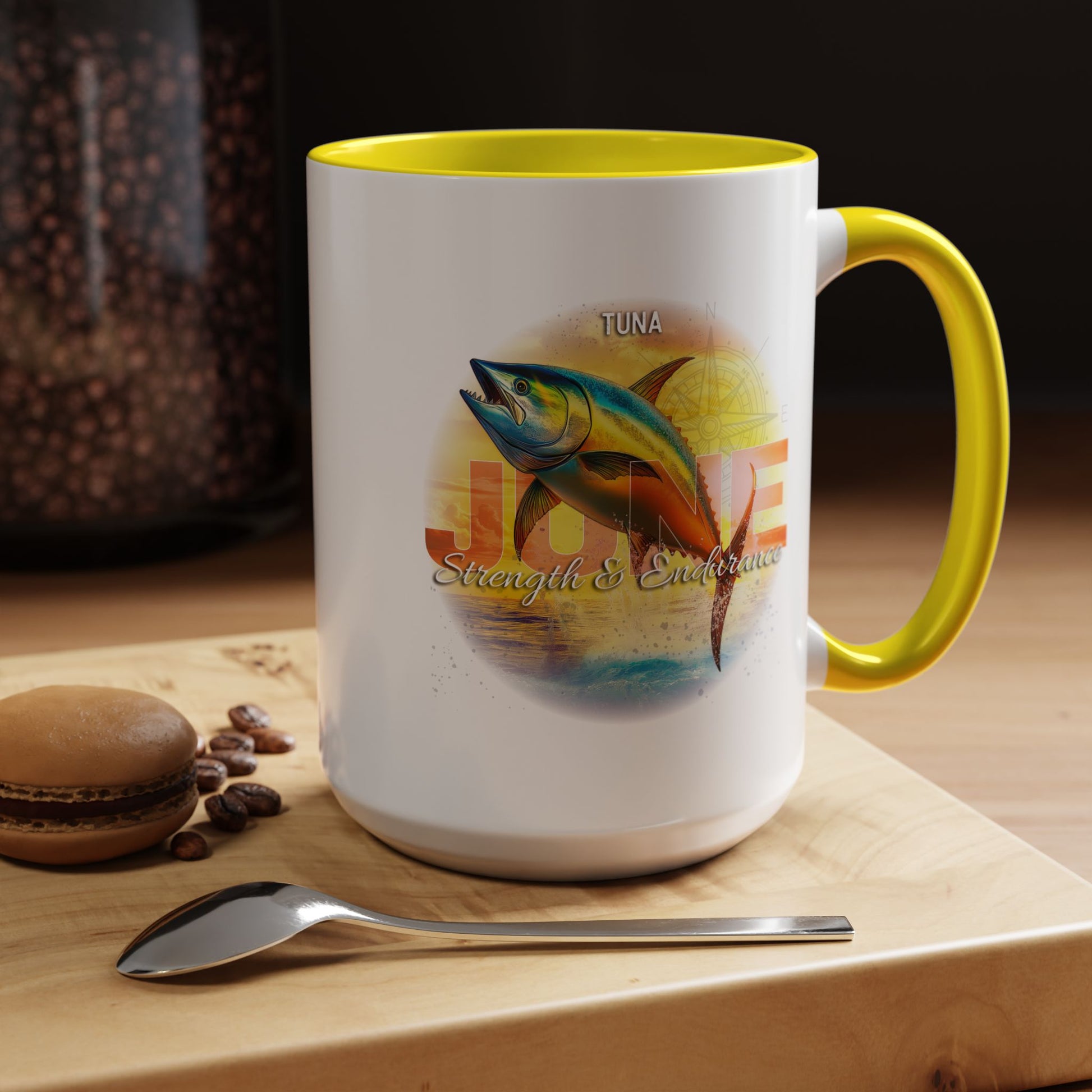 Birth month coffee mug with yellow handle and tuna fish design for June