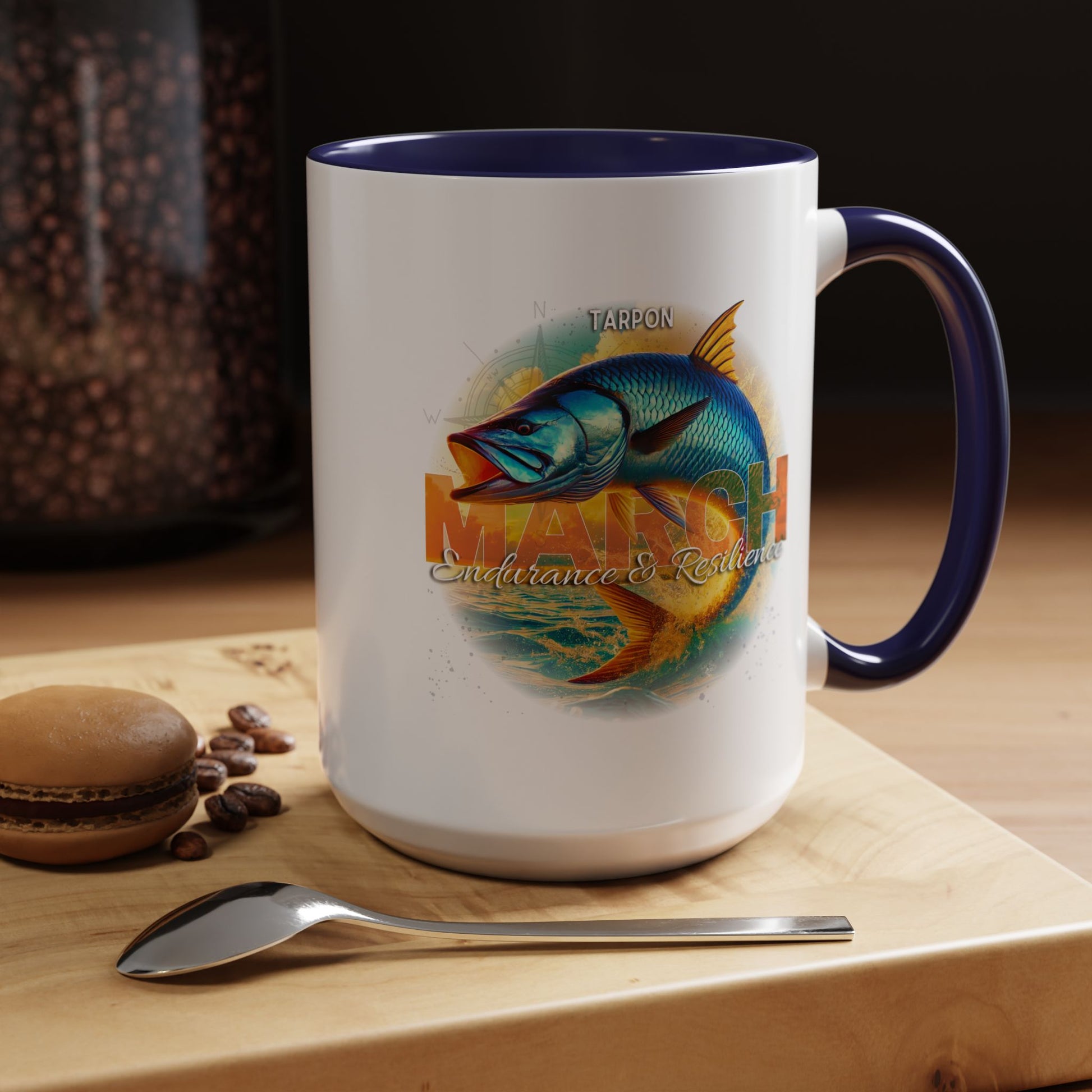 March birth month coffee mug with colorful fish design and navy blue handle and rim