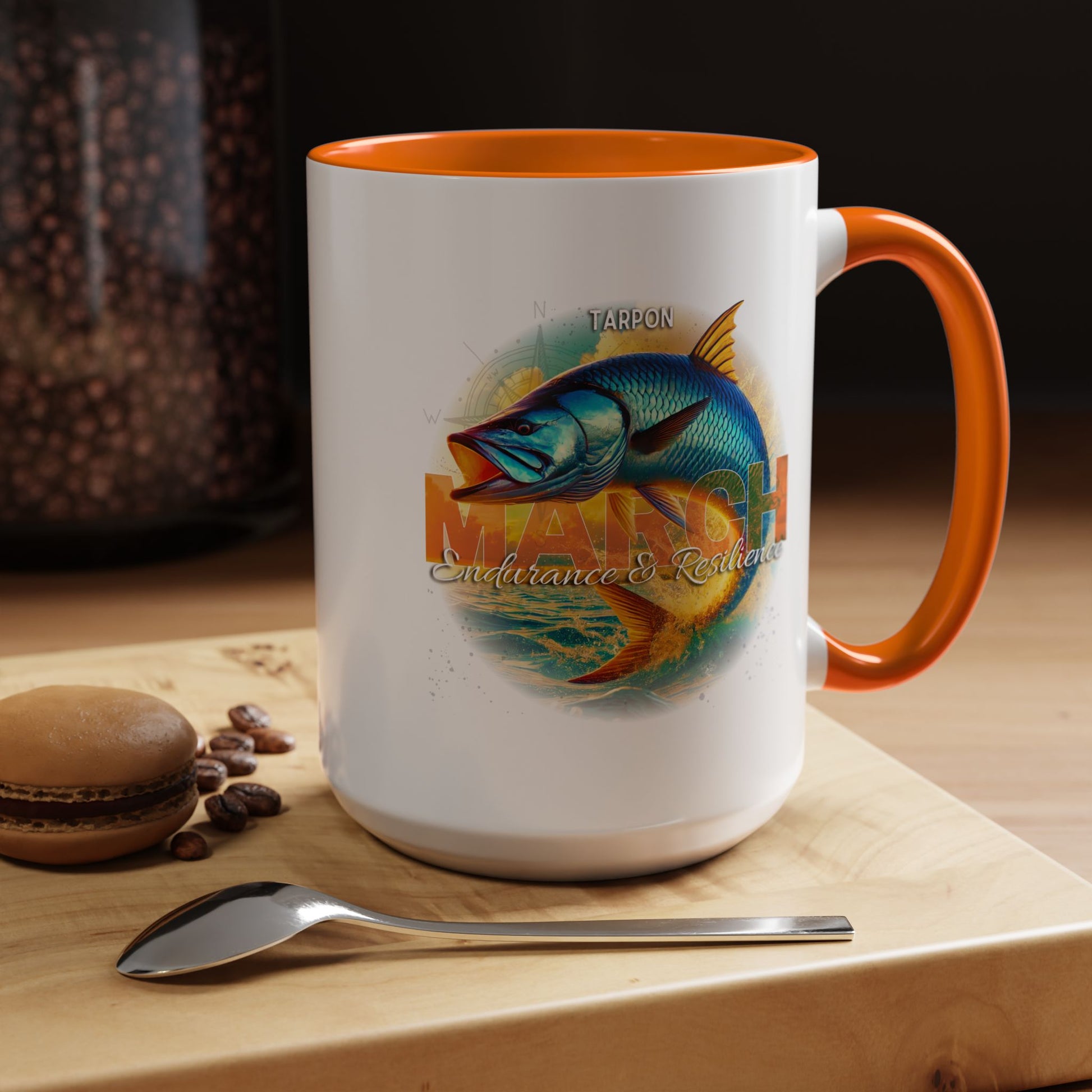 Birth month coffee mug for March with colorful fish design and orange handle