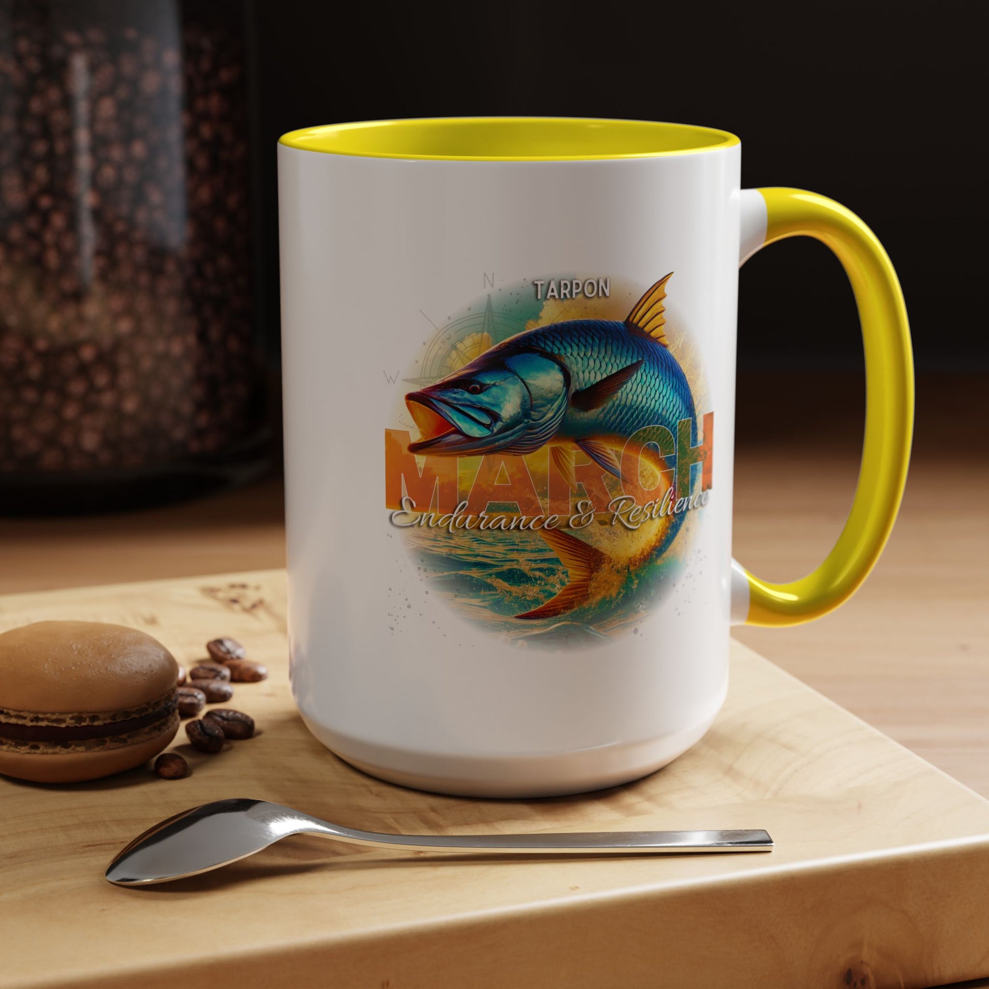 March birth month coffee mug featuring colorful tarpon fish design with yellow handle and rim