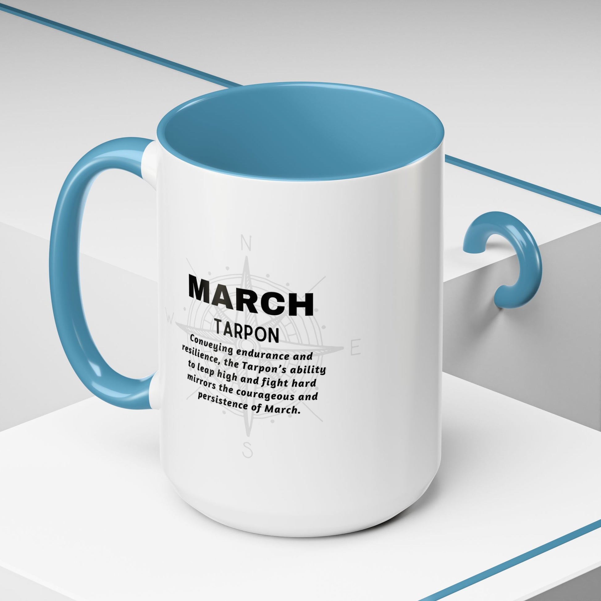 White birth month coffee mug for March with blue handle and inner color featuring Tarpon design