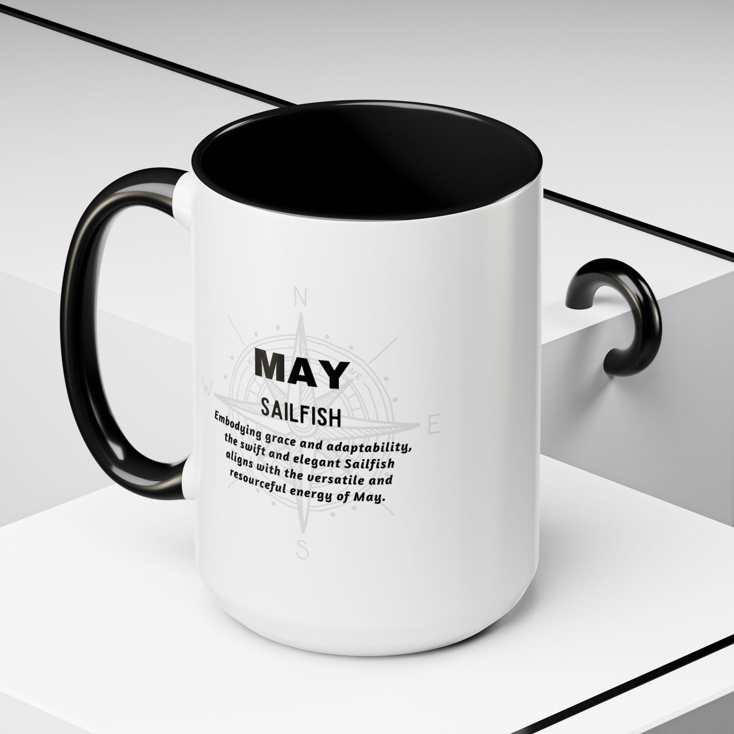 May birth month coffee mug with black handle and interior featuring Sailfish design