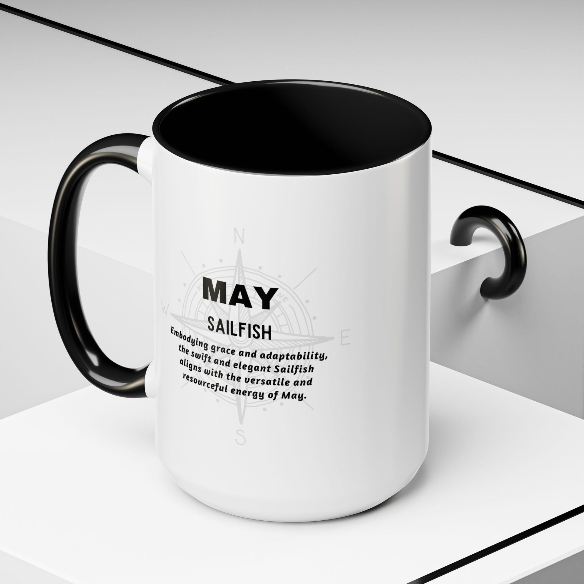 May birth month coffee mug with black handle and interior featuring Sailfish design