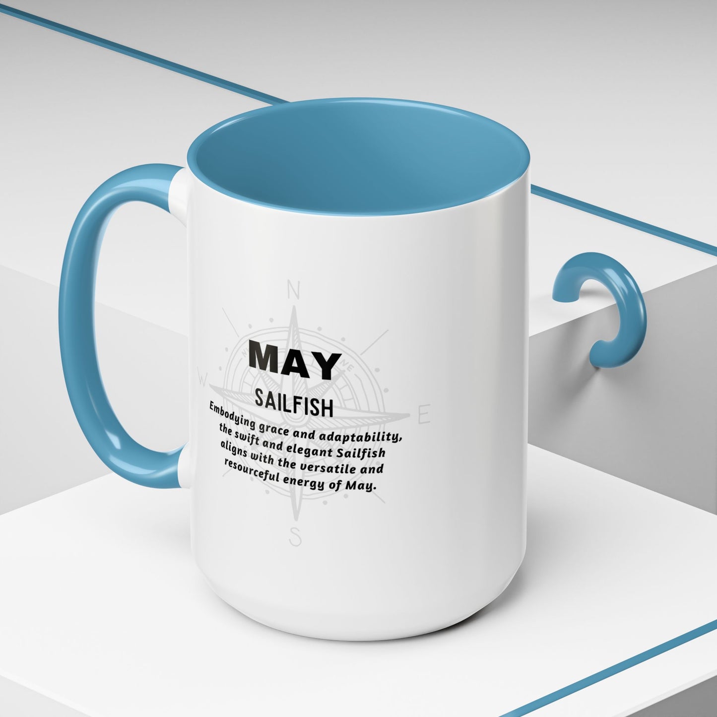 May birth month coffee mug with sailfish design featuring blue handle and interior