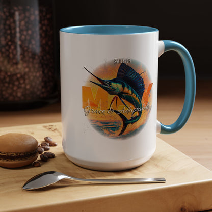 Birth month coffee mug featuring a colorful sailfish design with blue handle and interior