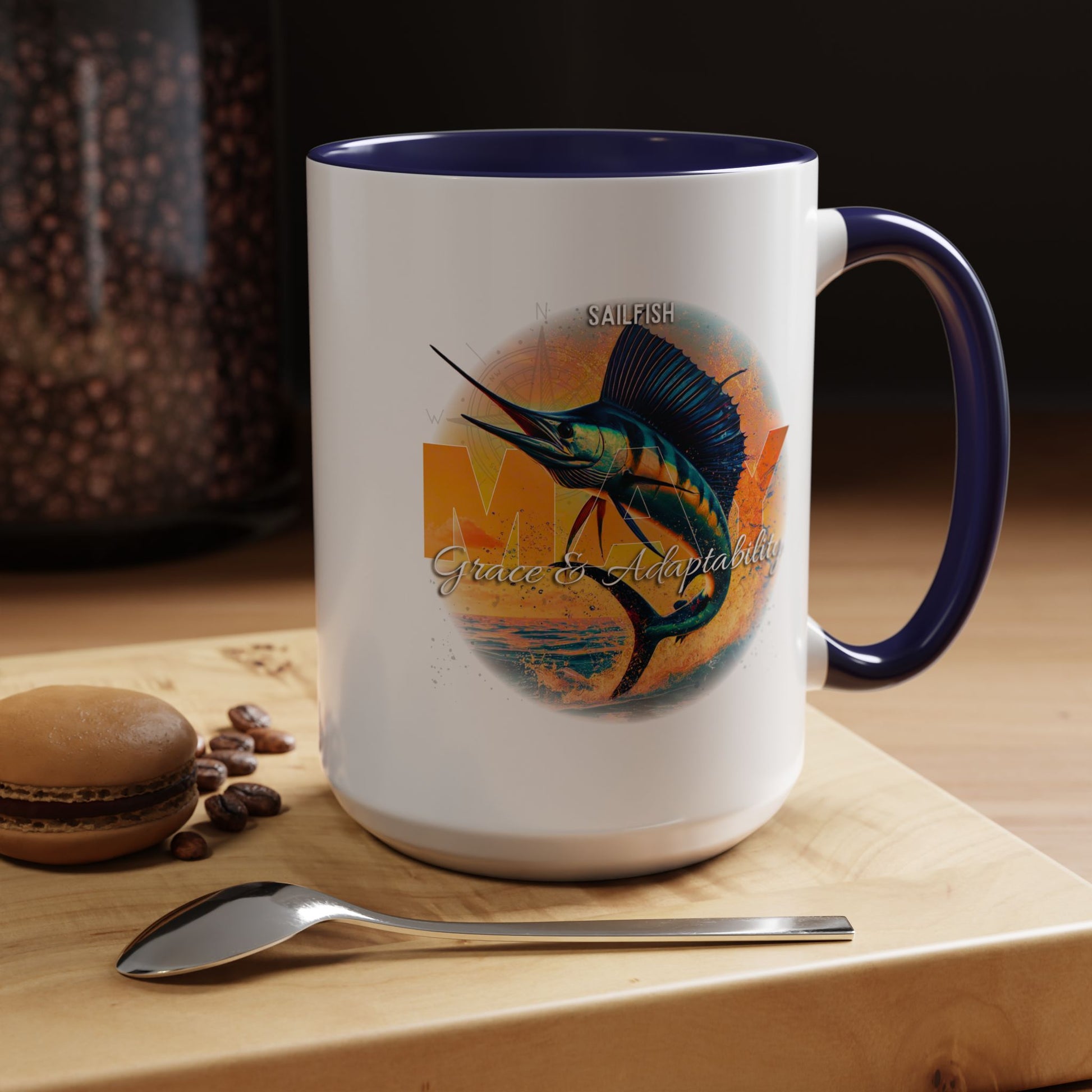 Birth month coffee mug with sailfish design and navy blue handle and interior