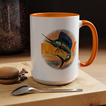 Birth month coffee mug featuring an orange handle and inside with a sailfish design and motivational text
