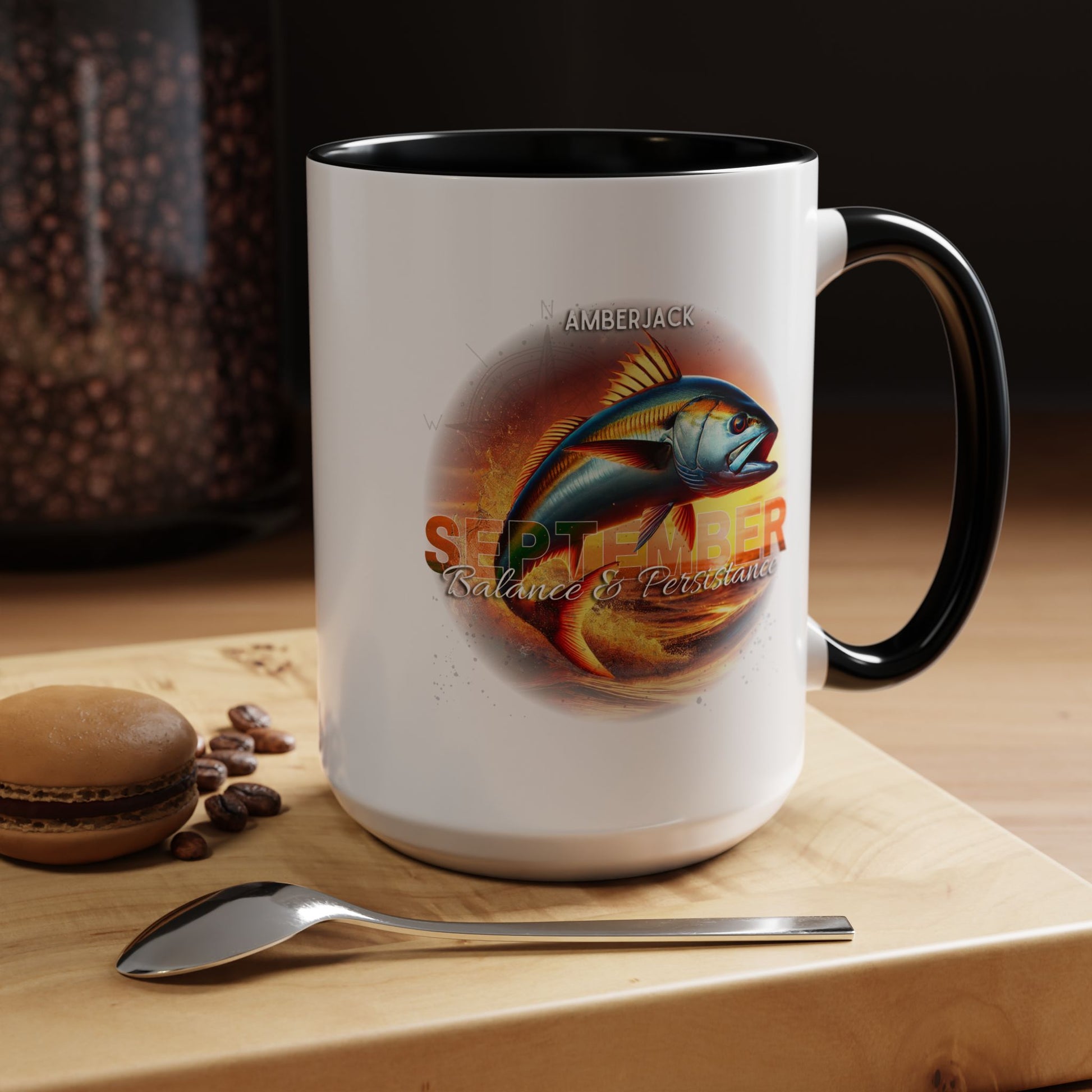 Birth month coffee mug September design with fish graphic and black handle on wooden table