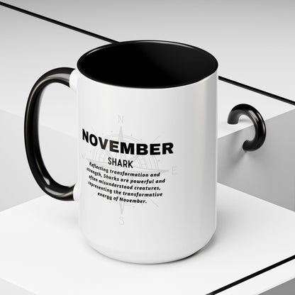 November birth month coffee mug with black handle and inside featuring shark design and motivational text