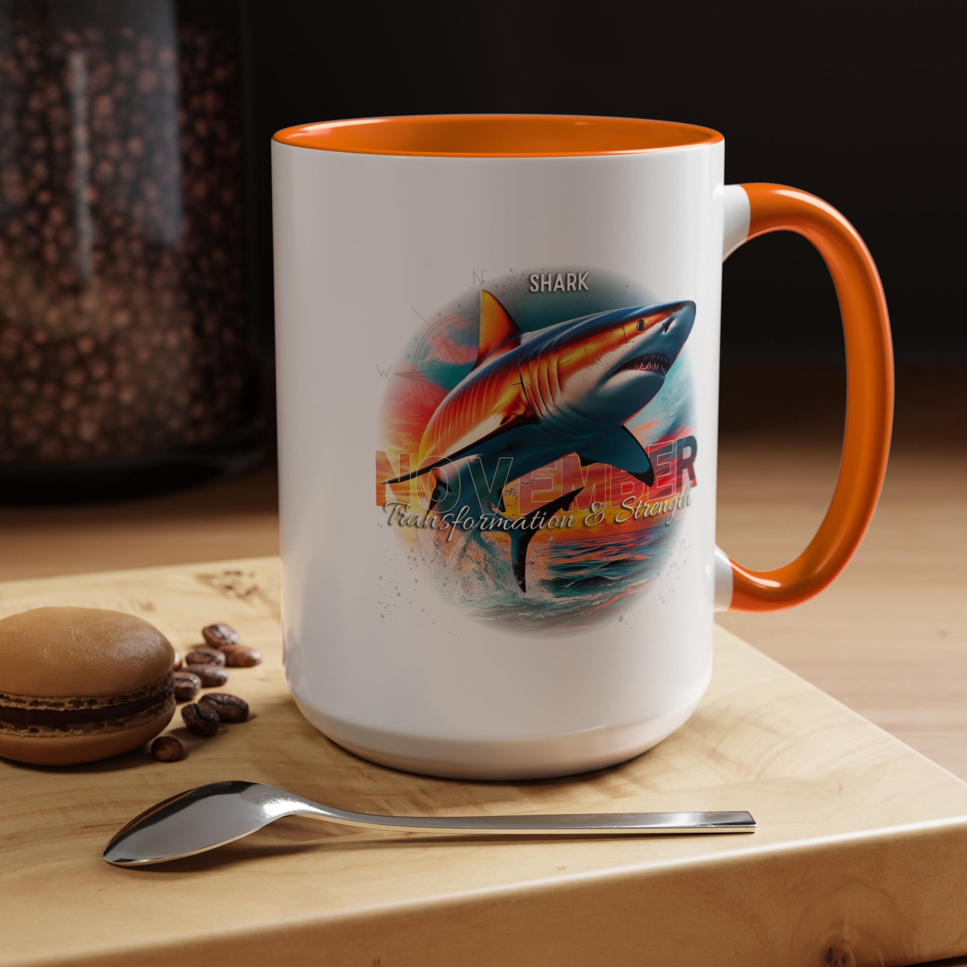 Birth month coffee mug featuring shark design with orange handle and interior