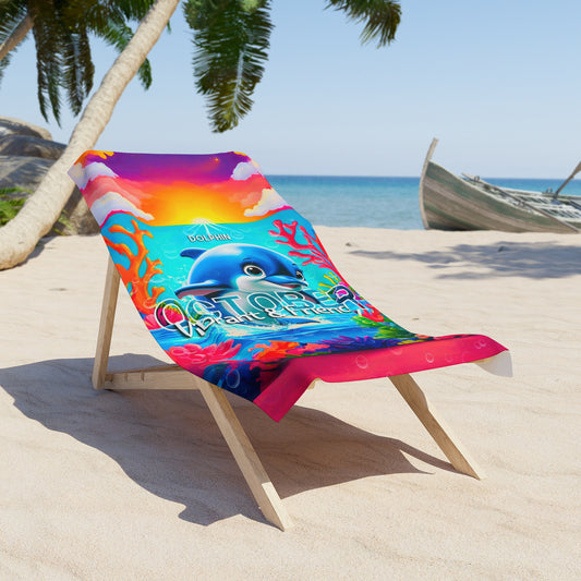 Colorful birth month kids beach towel with dolphin design on lounge chair at sandy beach