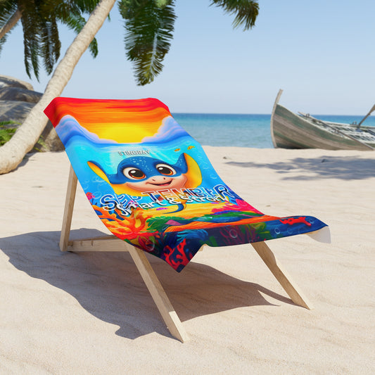 Colorful birth month kids beach towel with cartoon sea life design on a wooden beach chair