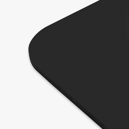 Close-up of black birth month mouse pad with smooth surface and rounded corners for home decor