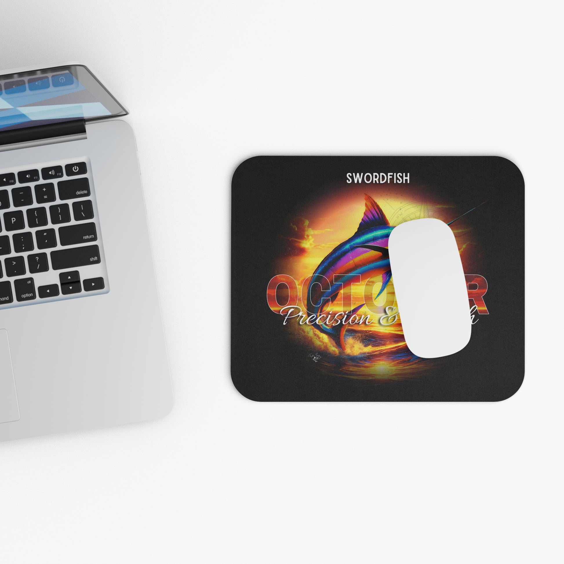 Swordfish design birth month mouse pad with vibrant ocean artwork and computer mouse