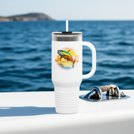 White birth month travel mug with colorful tuna fish design on a boat by the ocean
