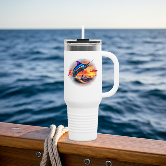 White birth month travel mug with marlin fish design on a wooden boat railing by the ocean
