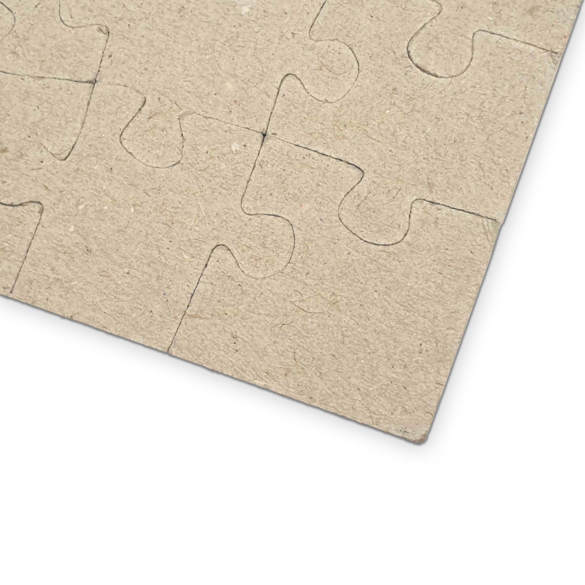Close-up of blank cardboard puzzle pieces kids birth month puzzle for creative learning