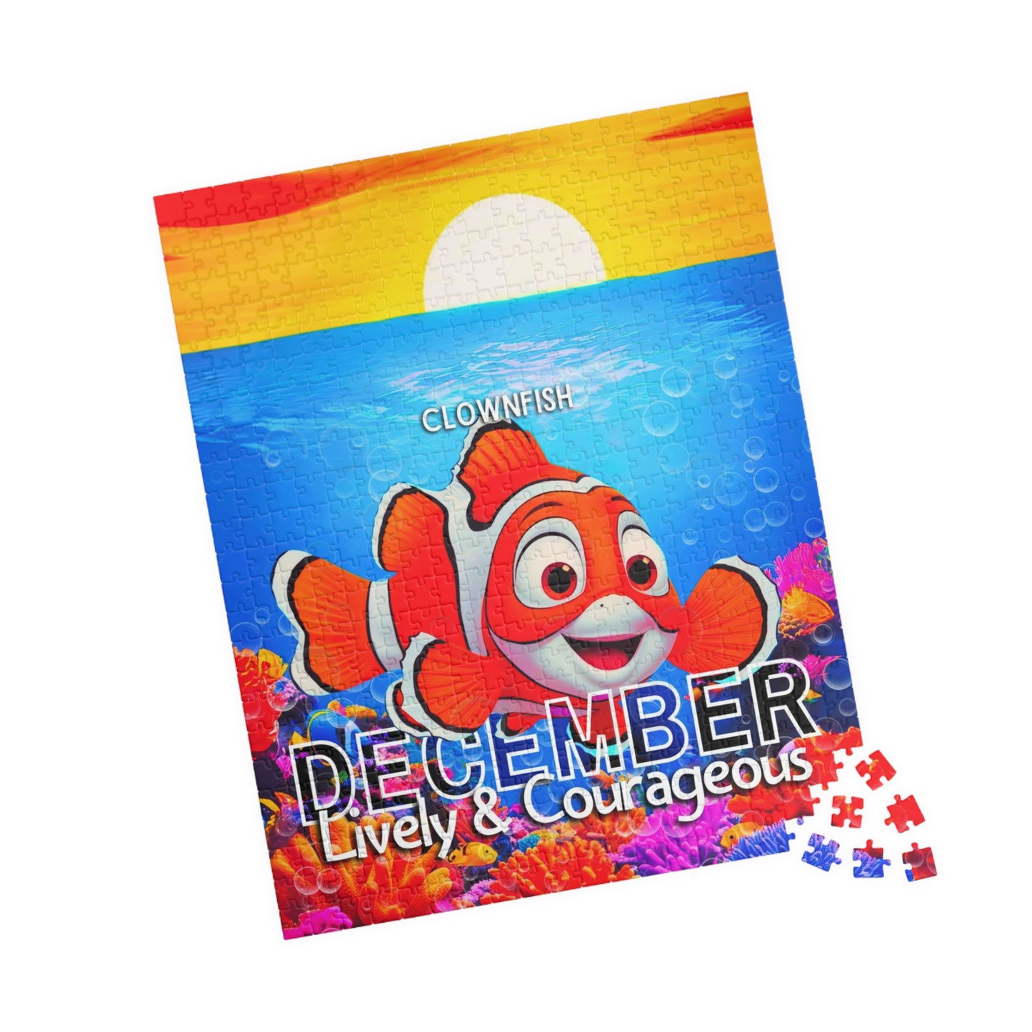 Kids birth month puzzle featuring December with a colorful clownfish and ocean background