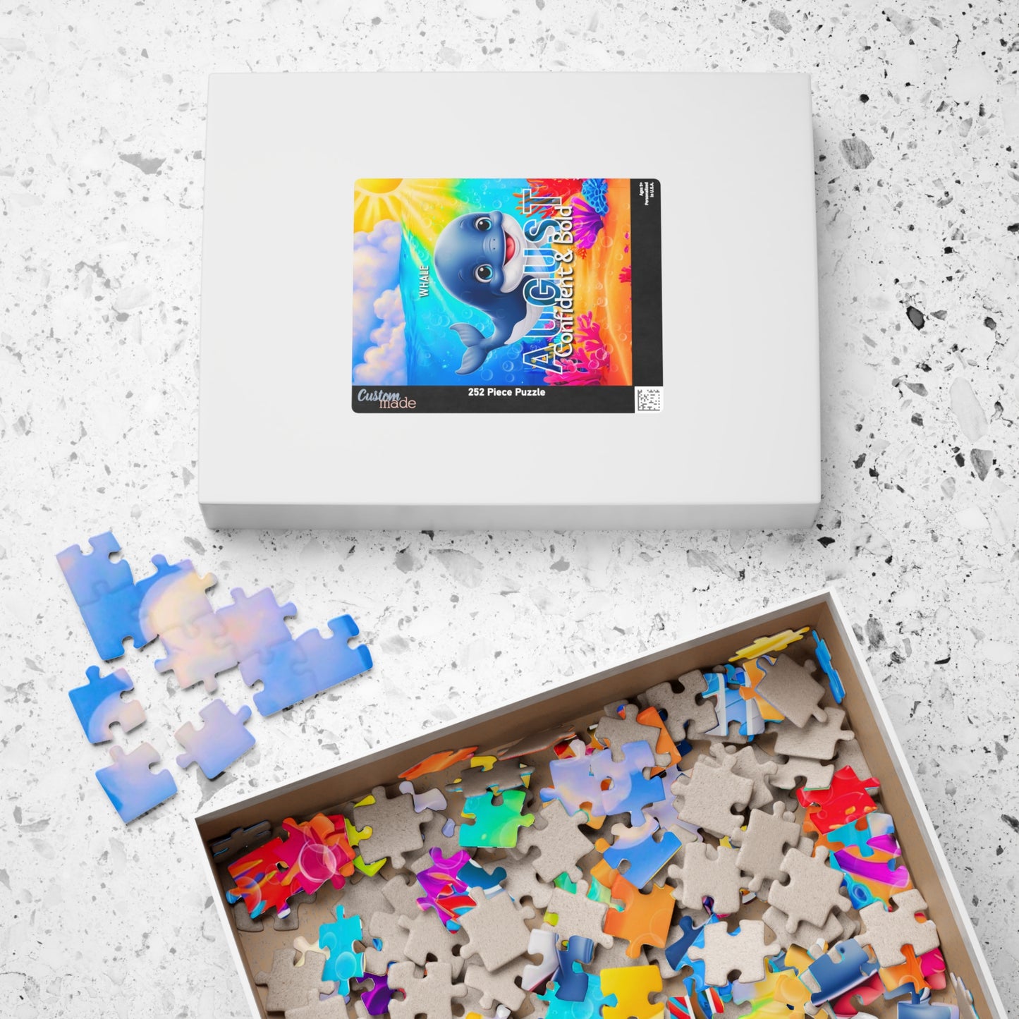 Kids birth month puzzle featuring colorful sea life design with scattered puzzle pieces
