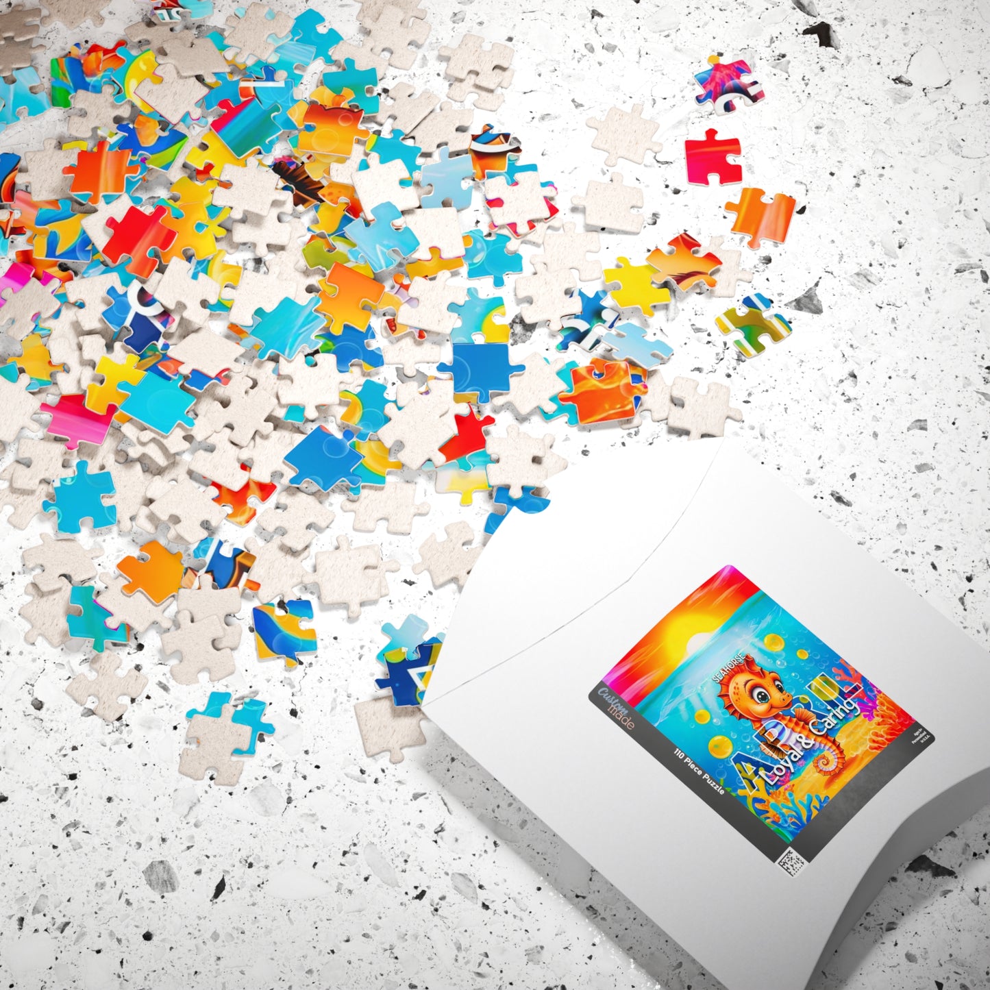 Kids birth month puzzle with colorful scattered pieces and white packaging on a textured surface