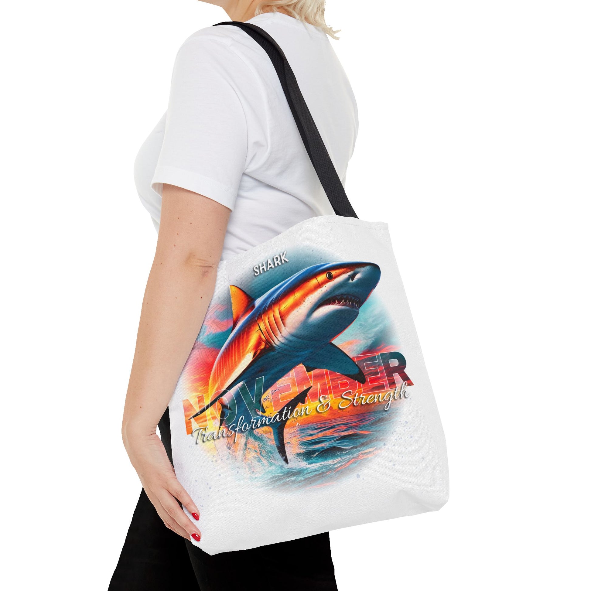 Birth month beach tote with vibrant shark design and transformation strength text