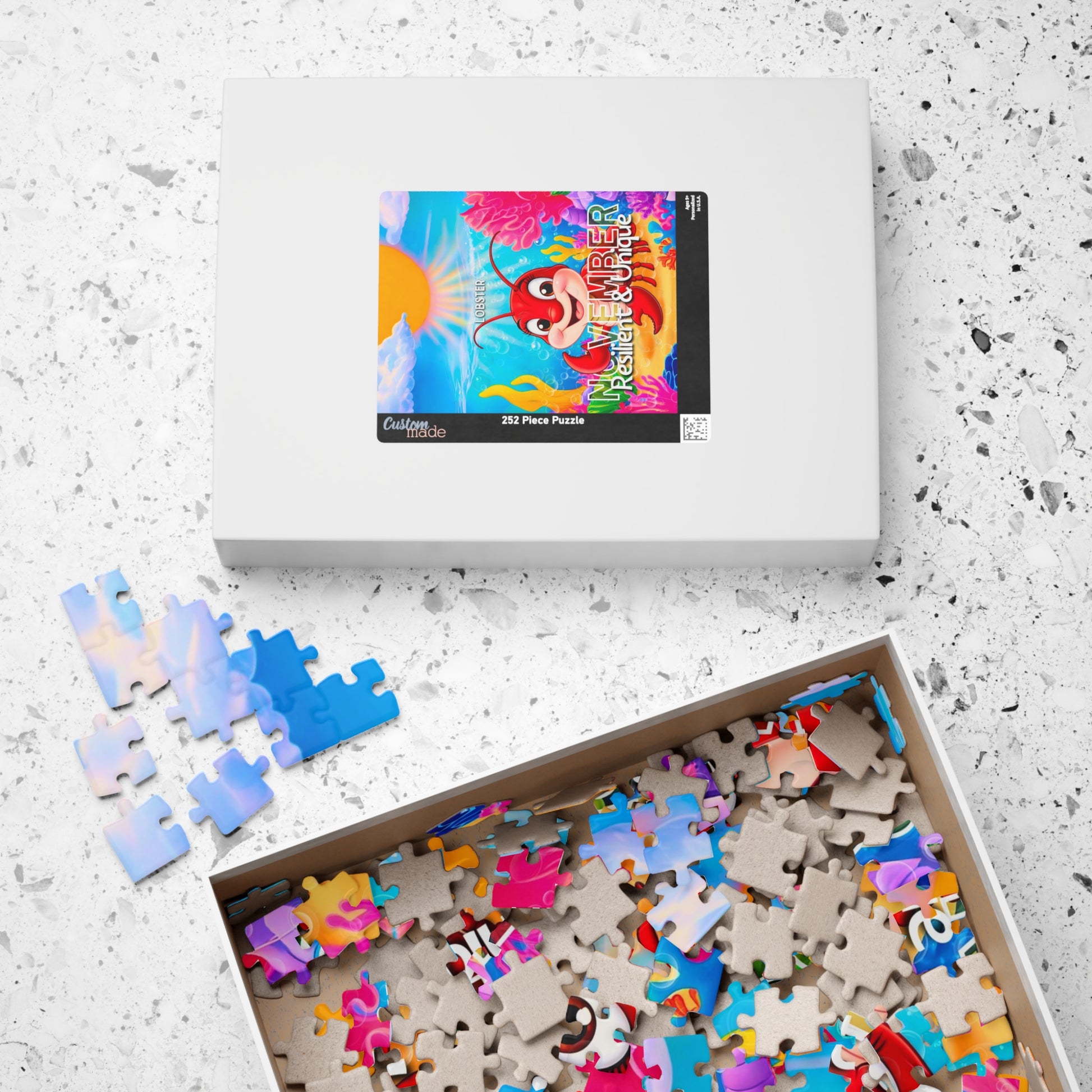 Kids birth month puzzle with colorful pieces and playful design in a white box