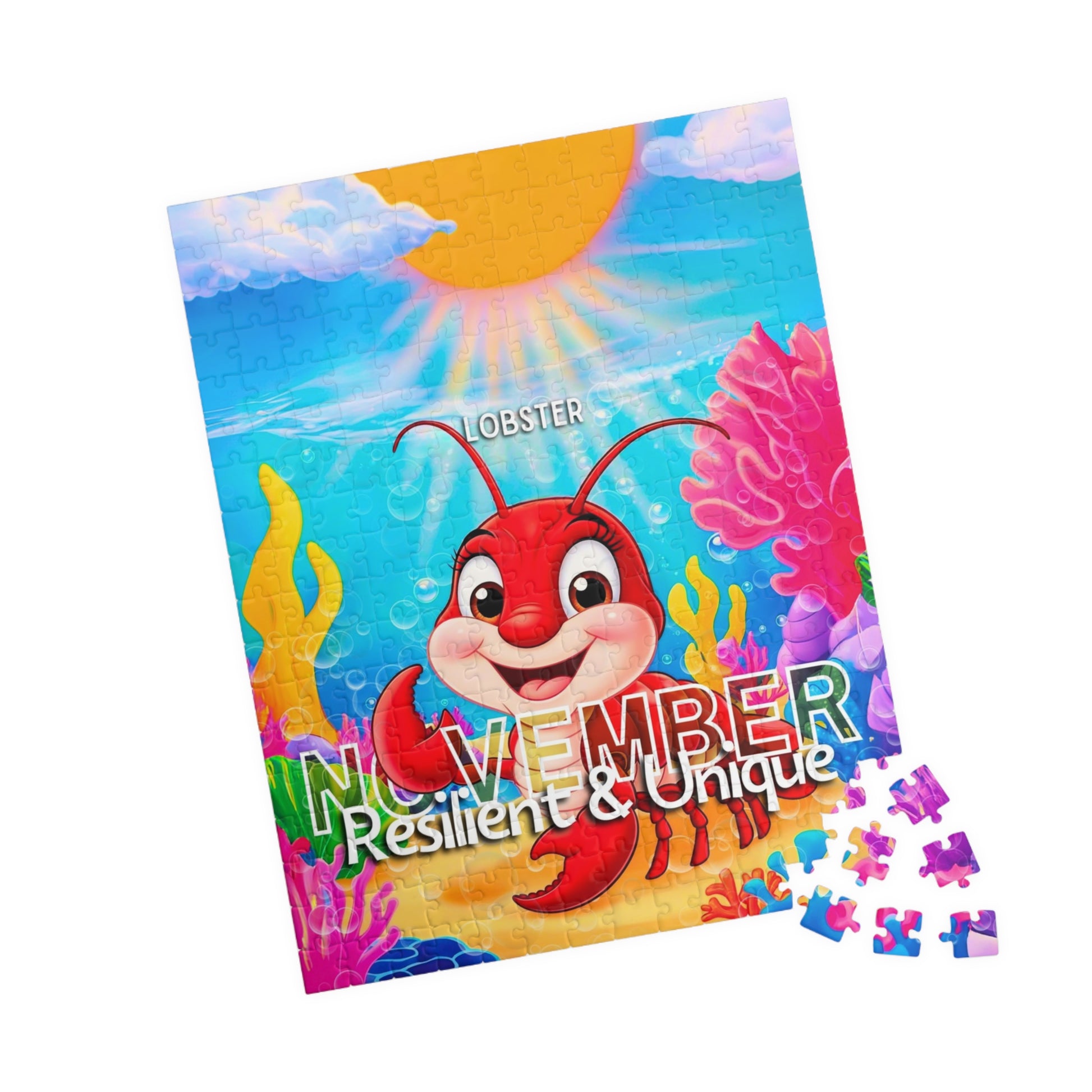 Kids birth month puzzle featuring a colorful lobster design for November with Resilient and Unique traits